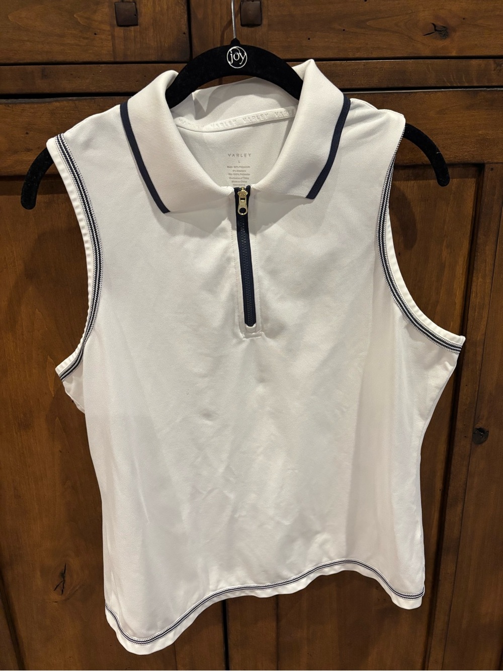 Varley White Sleeveless Golf Shirt with Black Trim